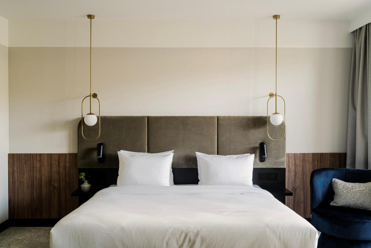 Royal Tulip Sand Kolobrzeg Luaran gambar A bedroom at the hotel
