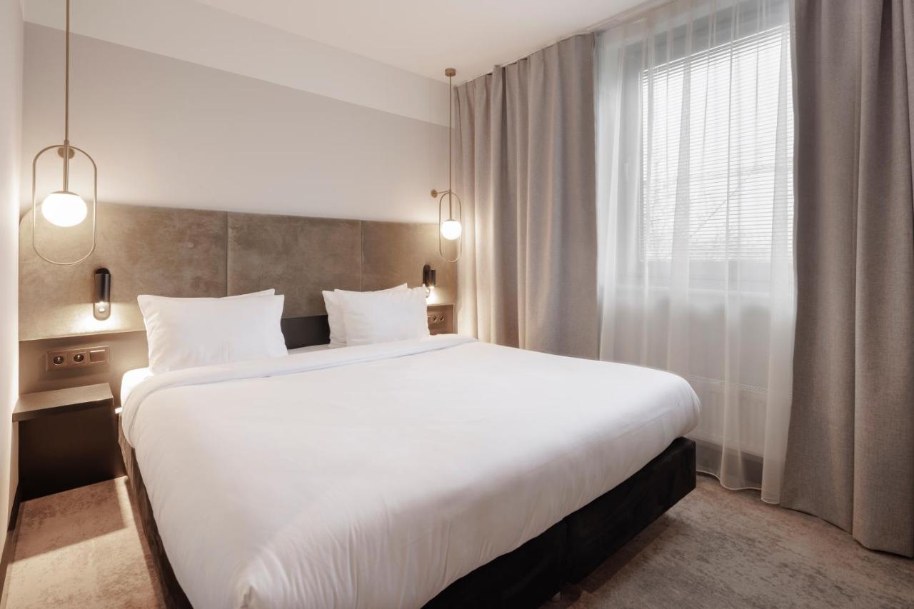 Royal Tulip Sand Kolobrzeg Luaran gambar A bedroom at the hotel