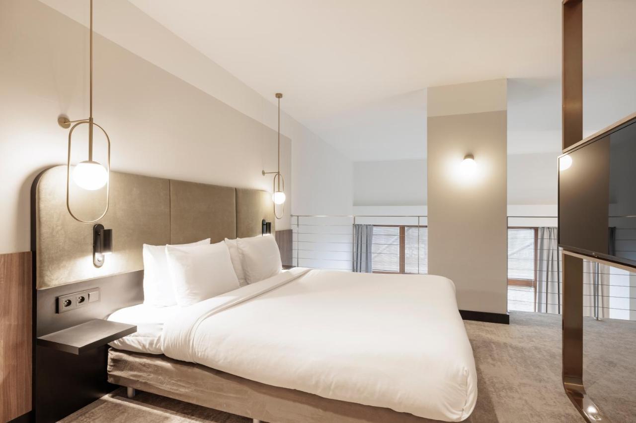 Royal Tulip Sand Kolobrzeg Luaran gambar A bedroom at the hotel