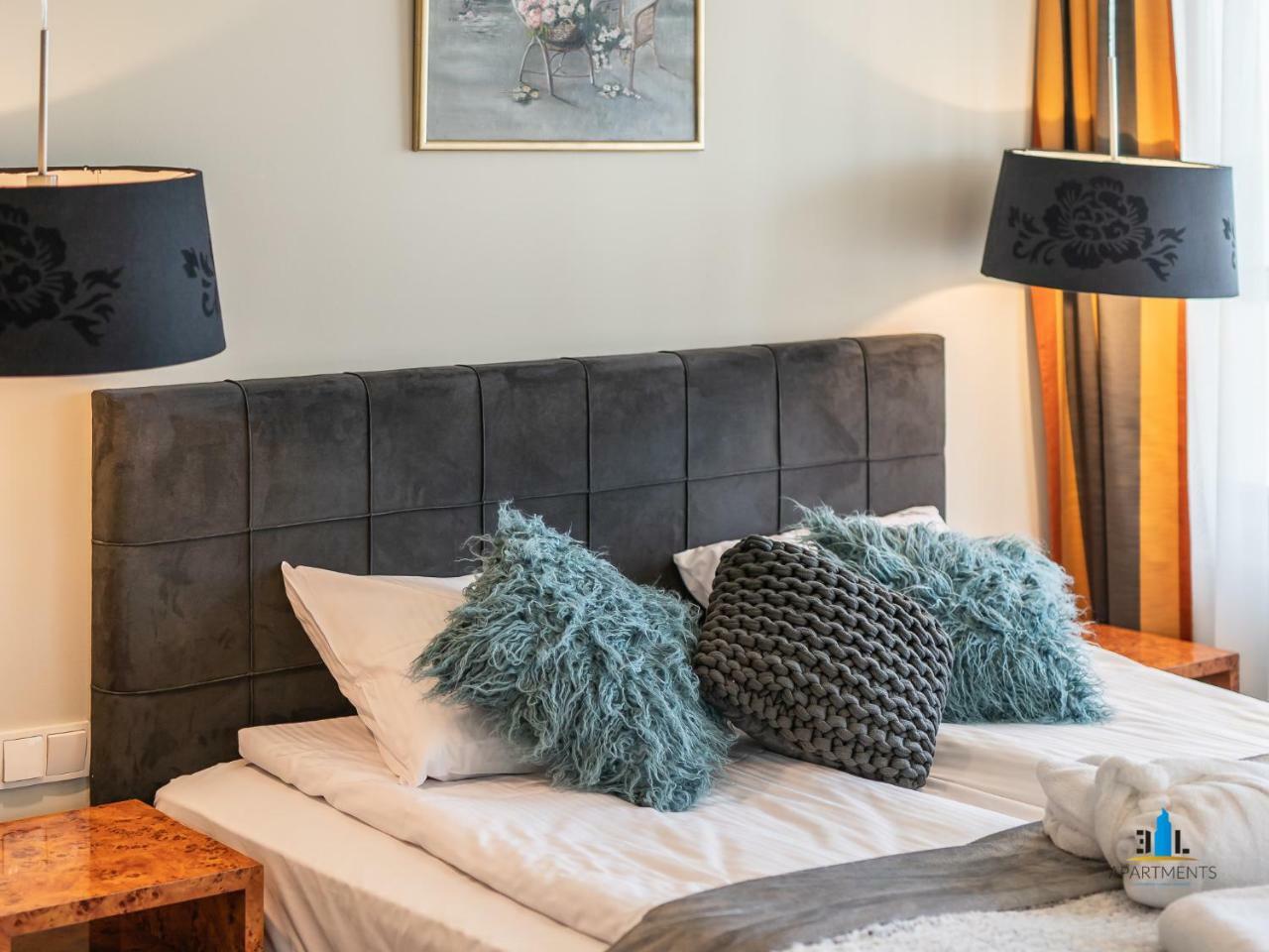 Royal Tulip Sand Kolobrzeg Luaran gambar A bed with a headboard